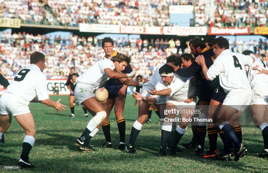 Sport. Rugby Union. pic: 19th May 1984. England Tour of South Africa. Currie Cup B Section 21. v England 31. England's John Fidler passes the ball supported by Chris Butcher as Richard Hill waits to collect.