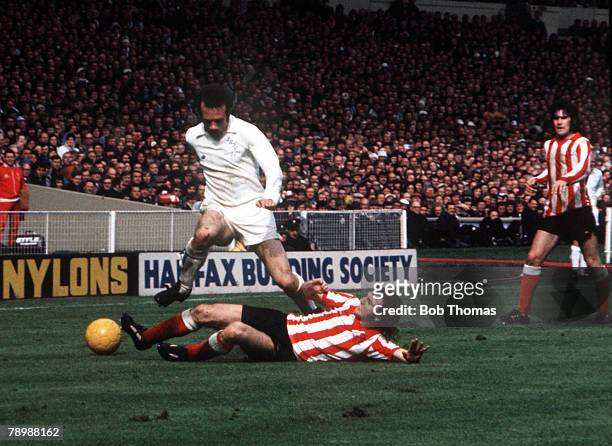 Football, 1973 FA Cup Final, Wembley Stadium, 5th May Sunderland 1 v Leeds United 0, Leeds United's Paul Reaney takes the ball past the sliding...