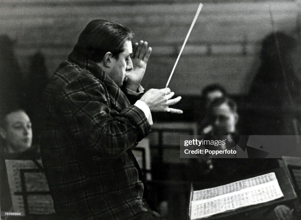 Music Personalities. pic: circa 1949. Manchester. Sir John Barbirolli, (1899-1970) celebrated English conductor, pictured working with the Halle Orchestra. Barbirolli's illustrious career saw him lead the London Symphony Orchestra, the New York Philharmon