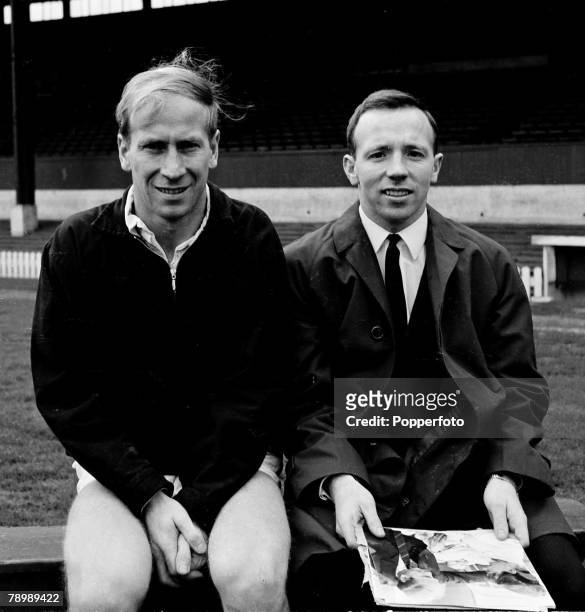 Football, Circa 1960's, Manchester United's Bobby Charlton and Nobby Stiles sitting togther