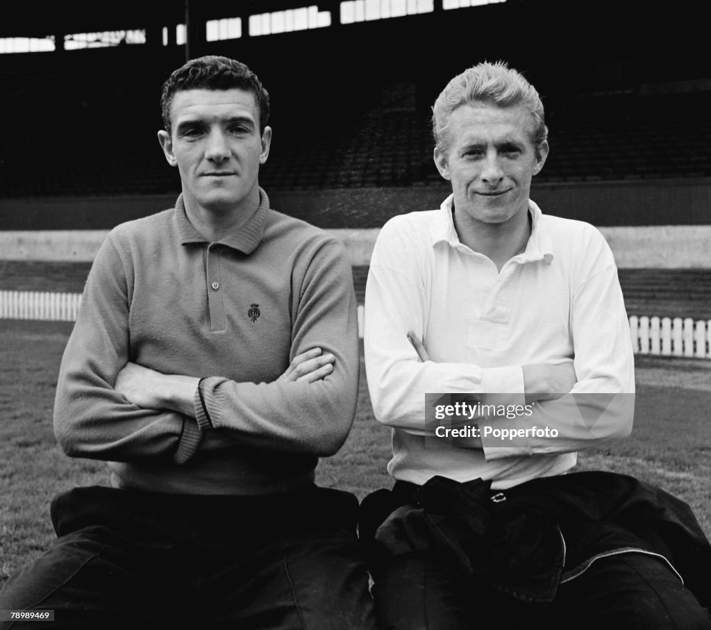 Football. Circa 1960's. Manchester United's Dennis Law and Bill Foulkes ( left) sit together on a bench.