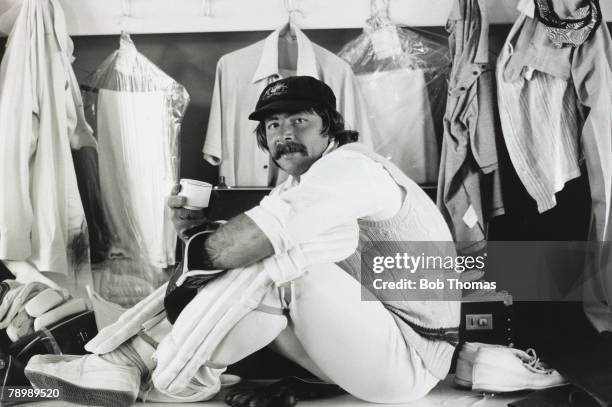 August 1977, 5th Test Match at the Oval, England v Australia, Match Drawn, Australia wicket-keeper Rod Marsh relaxes with a cup of tea in the...