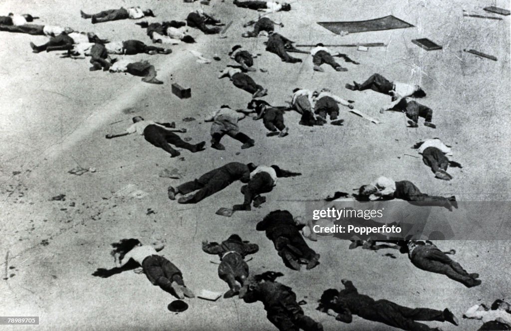 War and Conflict. Spanish Civil War. (1936-1939) pic: July 1936. The courtyard of the Montana Barracks after the surrender to the "Reds" showing some of the prisoners that were shot dead in cold blood. With what started as a military uprising in Morocco, 