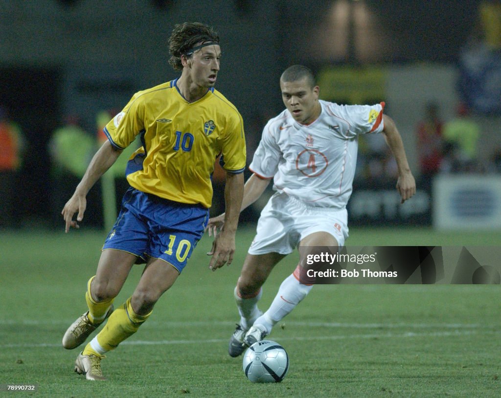 BT Sport. Football. UEFA European Championships. Euro 2004. Algarve, Faro-Loule. 26th June 2004. Quarter Final. Holland 0 v Sweden 0, after extra time. Holland won on penalties. Wilfred Bouma of Holland with Sweden's Zlatan Ibrahimovic.