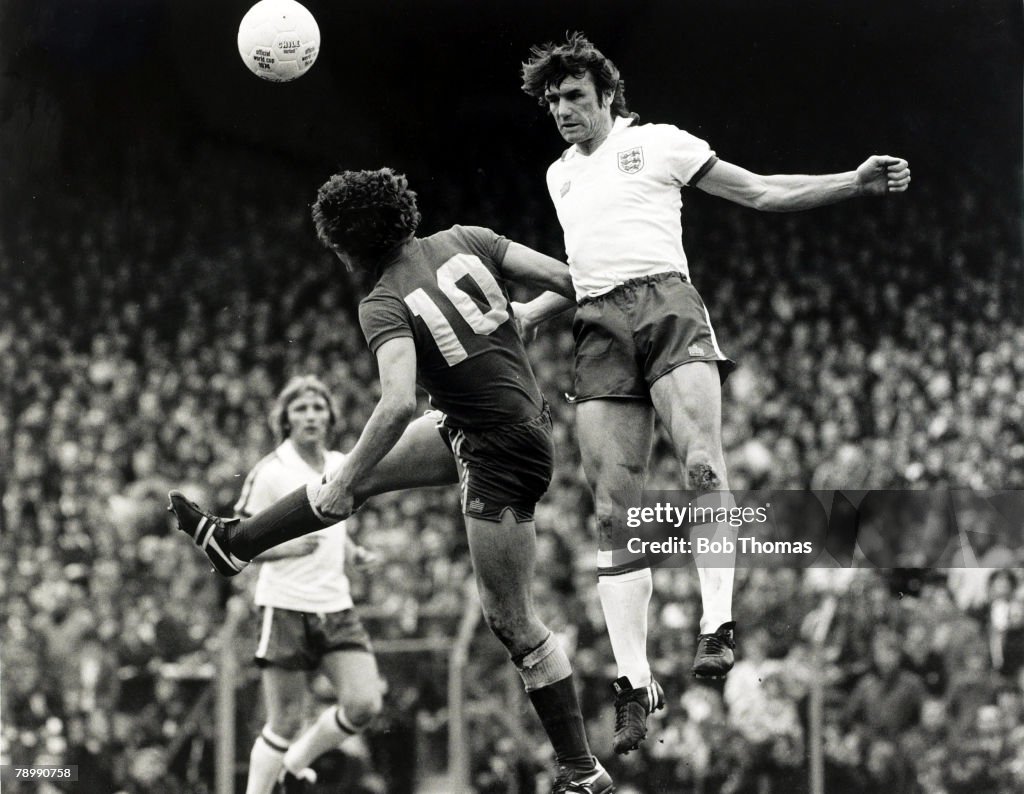 Sport. Football. pic: 13th May 1978. British Championship. Wales 1.v England 3. at Ninian Park, Cardiff. England's Dave Watson wins the ball in the air with a powerful header.