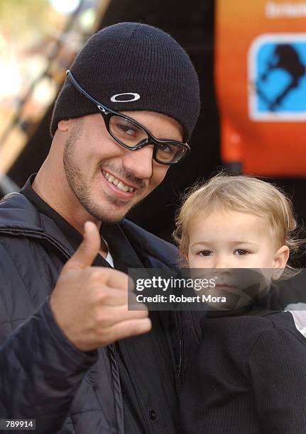 Extreme athlete Bob Burnquist and son attend ESPN's Ultimate X movie premiere May 6, 2002 in Universal City, CA.