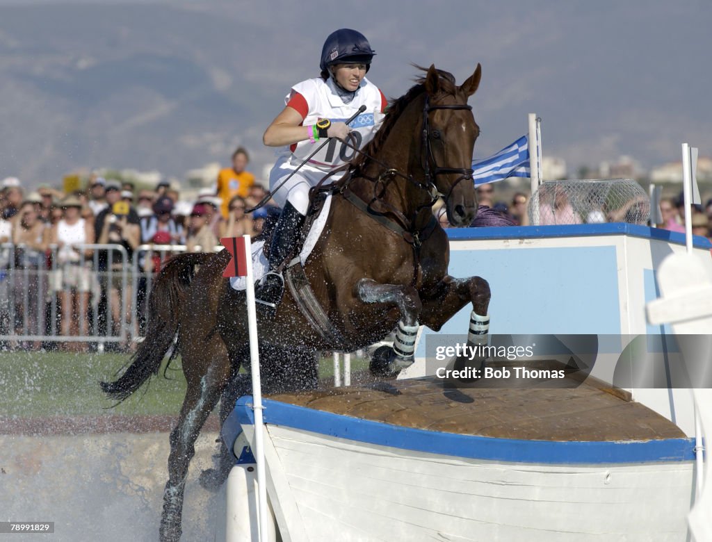 BT Sport. Olympic Games, Athens, Greece. 17th August 2004. Equestrian. Three Day Eventing, Cross Country. The Water Jump. Jeanette Brakewell of Great Britain riding "Over to You".
