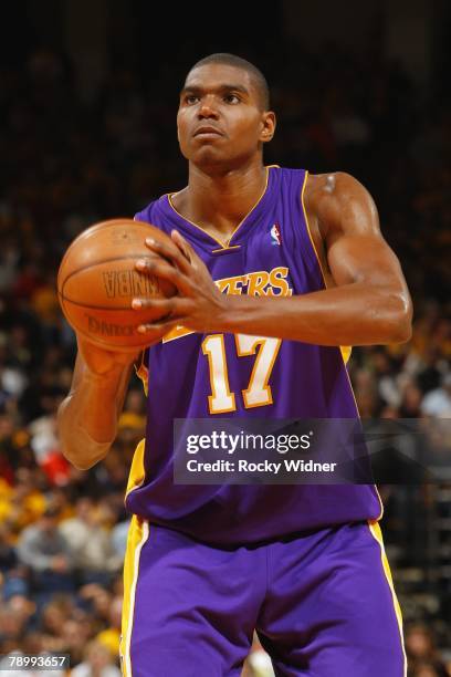 Andrew Bynum of the Los Angeles Lakers shoots a free throw during the game against the Golden State Warriors at The Arena in Oakland on December 14,...