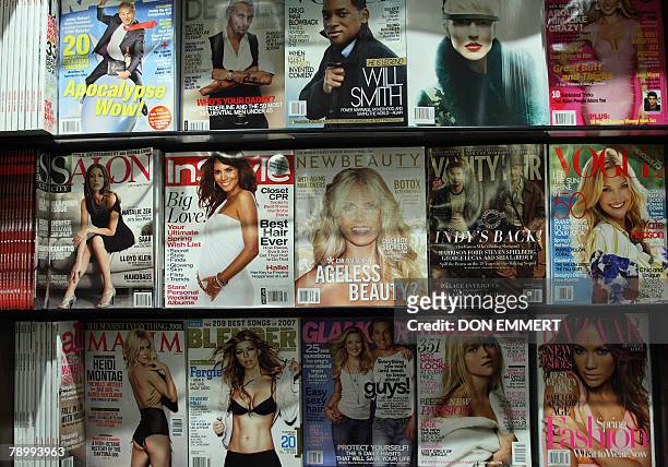 Fashion magazines are displayed on the shelves of a Manhattan news stand 14 January 2008 in New York. Courted by designers and fashion houses and a...