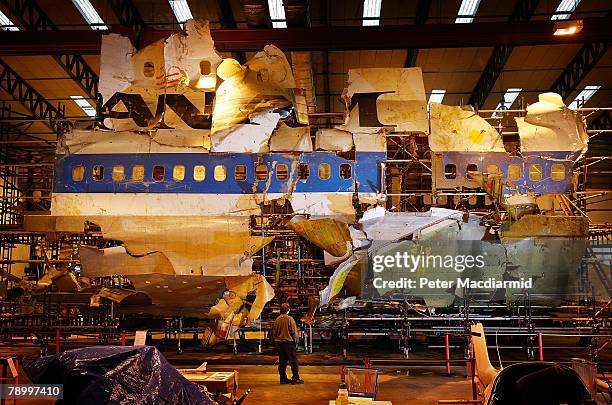 The reconstructed remains of Pan Am flight 103 lie in a warehouse on January 15, 2008 in Farnborough, England. The Air Accident Investigation Branch...