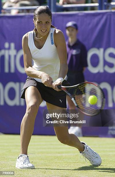 Anastasia Myskina of Russia in action against Anne Kremer of Luxemberg during the quarter final of the ladies singles in the Britannic Asset...