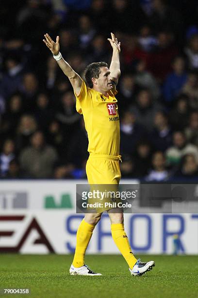Robbie Keane of Tottenham celebrates his opening goal during the FA Cup sponsored by E.ON third round replay match between Reading and Tottenham...