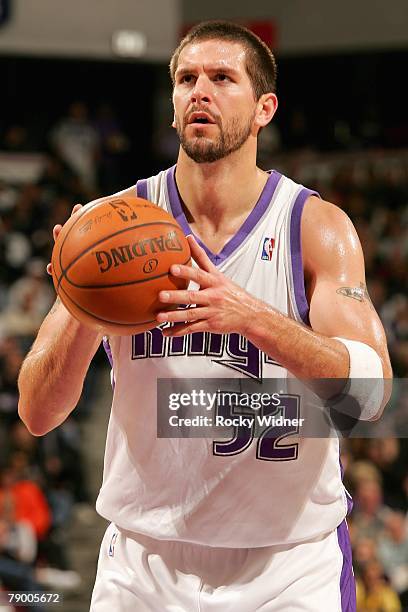 Brad Miller of the Sacramento Kings shoots a free throw during the game against the Boston Celtics on December 26, 2007 at Arco Arena in Sacramento,...