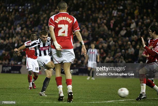 James Morrison of West Brom scores their second goal during the FA Cup Sponsored by e.on Third Round replay match between West Bromwich Albion and...