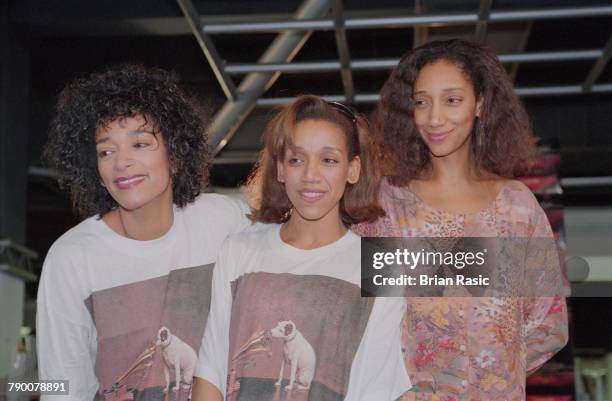 Joni Sledge, Kim Sledge and Debbie Sledge of American vocal group Sister Sledge pictured together at an in-store appearance at the HMV record store...
