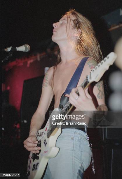 American musician and guitarist Jerry Cantrell performs live on stage with rock group Alice in Chains in London circa 1992.