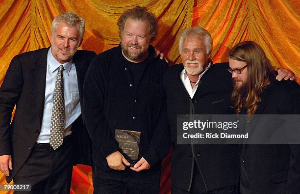 Songwriter Rivers Rutherford, Songwriter Don Schlitz, Singer Kenny Rogers and Songwriter Chris Stapleton at The Ryman Auditorium, for 45th Annual...