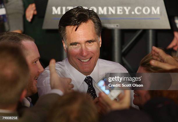 Republican Presidential hopeful former Massachusetts Gov. Mitt Romney greets supporters at a post-primary results rally at the Embassy-Suites hotel...