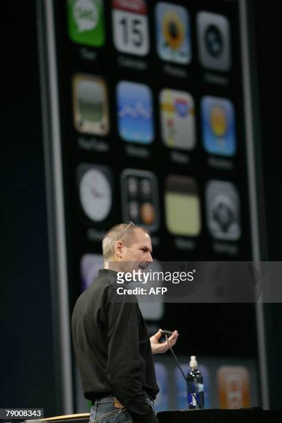 Apple CEO and co-founder Steve Jobs shows off the new applications for the iPhone at the MacWorld Conference & Expo in San Francisco 15 January 2008....