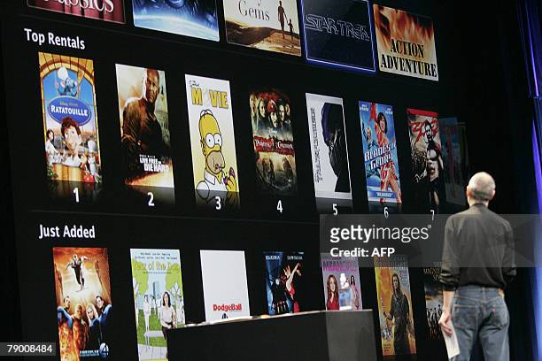 Apple CEO Steve Jobs shows off the new iTunes movie rentals at the MacWorld Conference & Expo in San Francisco, California 15 January, 2008. ITunes...