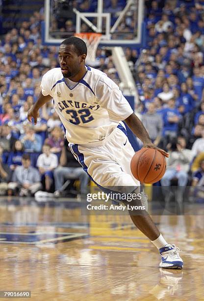 Joe Crawford of the Kentucky Wildcats dribbles the ball during the SEC game against the Vanderbilt Commodores at Rupp Arena January 12, 2008 in...