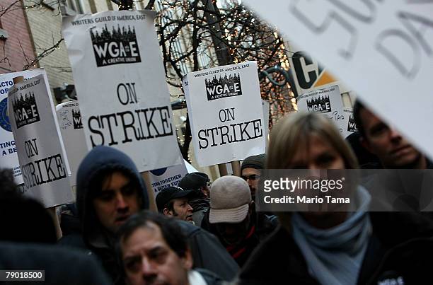 Members of the Writers Guild of America hold picket signs as they rally outside ABC's "One Life To Live" as part of the writers strike January 16,...