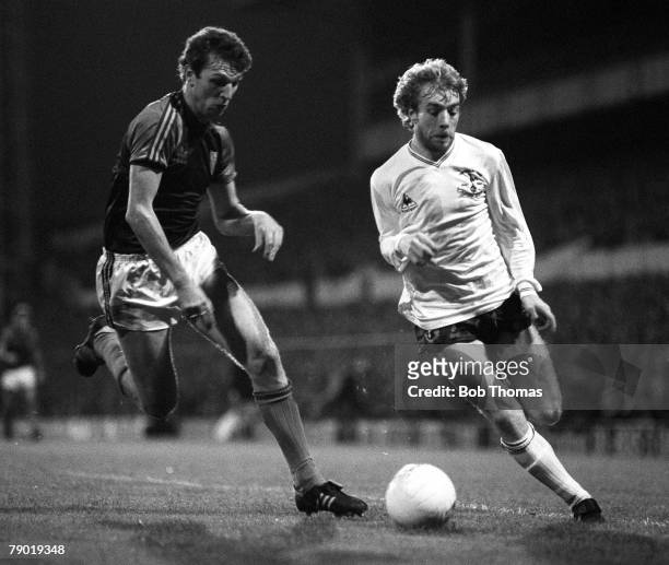 Football, Division One, 20th November 1982, Tottenham Hotspur 2 v West Ham United 1, Tottenham's Steve Archibald is pursued by West Ham's Alvin Martin