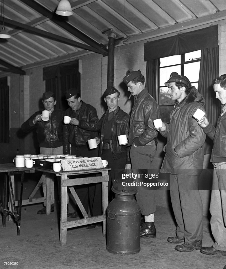 Consolidated B-24 Liberator Bomber Crews Return From Bombing Raid