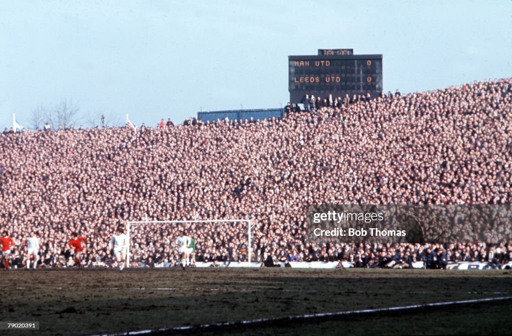 Football. Hillsborough. 1970 FA Cup Semi Final. 14th March, 1970. Manchester United 0 v Leeds United 0. The electronic scoreboard shows the score during the game, with a huge crowd of fans watching the game.