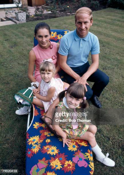 Manchester United and England footballer Bobby Charlton with his wife Norma and their two daughters Suzanne and Andrea, at the family home in...