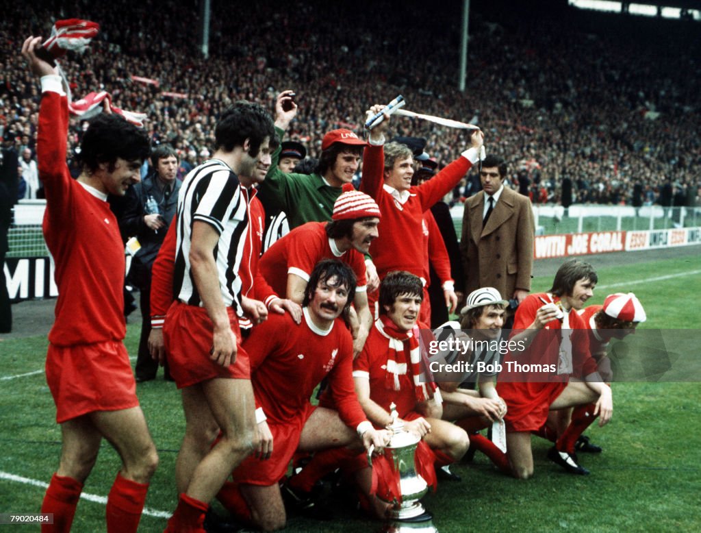 Football. 1974 FA Cup Final. Wembley Stadium. 4th May, 1974. Liverpool 3 v Newcastle United 0. The Liverpool team celebrate with the FA Cup trophy after the match.