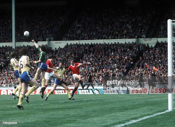 Football, 1976 FA Cup Final, Wembley Stadium, 1st May Southampton 1 v Manchester United 0, Southampton goalkeeper Ian Turner comes out to punch the...
