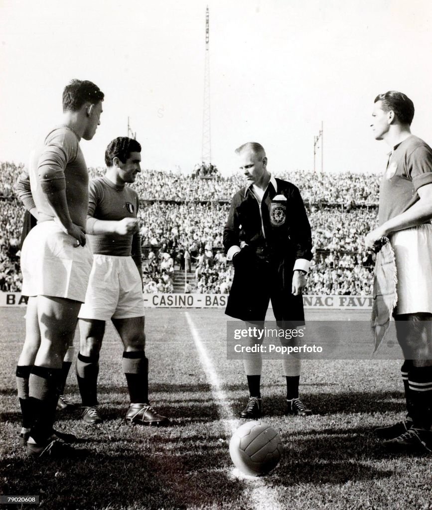Sport. Football. FIFA World Cup Finals. 23rd June 1954. Basle, Switzerland. Group Four. Italy 1 v Switzerland 2. Welsh referee Mervyn Griffiths with the team captains before the match.