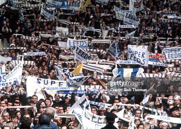 Football, 1972 FA Cup Final, Wembley Stadium, 6th May Leeds United 1 v Arsenal 0, A crowd of Leeds United fans waving scarves and banners during the...