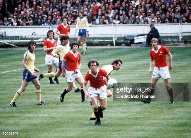 Football, 1976 FA Cup Final, Wembley Stadium, 1st May Southampton 1 v Manchester United 0, Manchester United's Stewart Houston chases after the ball