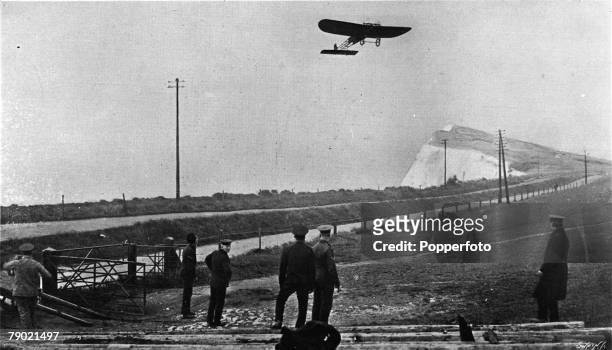 Aviation, Dover, England French aviator and aeronautics engineer Louis Bleriot is pictured in his aeroplane after he became the first person to fly...