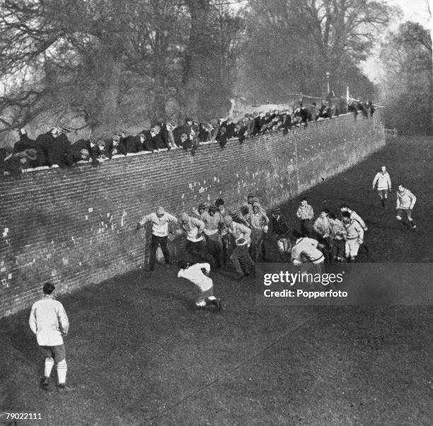 Sport, Berkshire, England Public school pupils are pictured playing the traditional Eton Wall Game