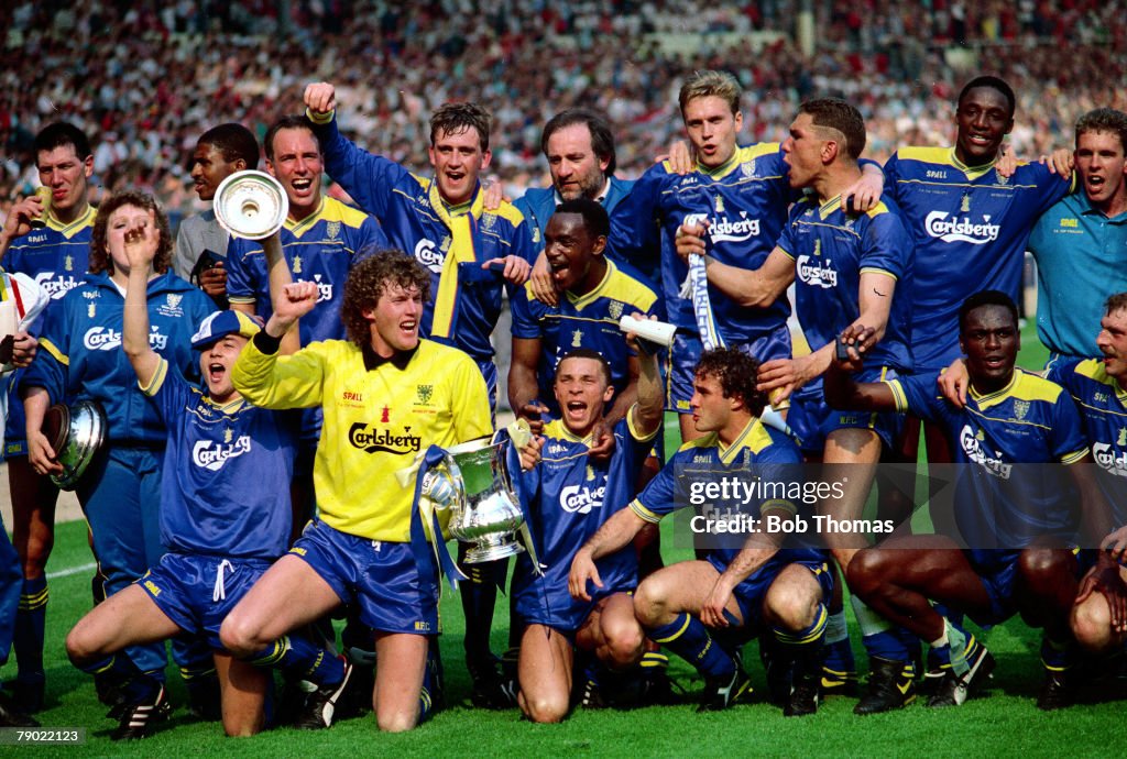 Football. 1988 F.A.Cup Final. Wembley. Wimbledon. 1. v Liverpool. 0. 14th May 1988. Wimbledon, the 1988 F.A. Cup winners celebrate with the F.A. Cup.