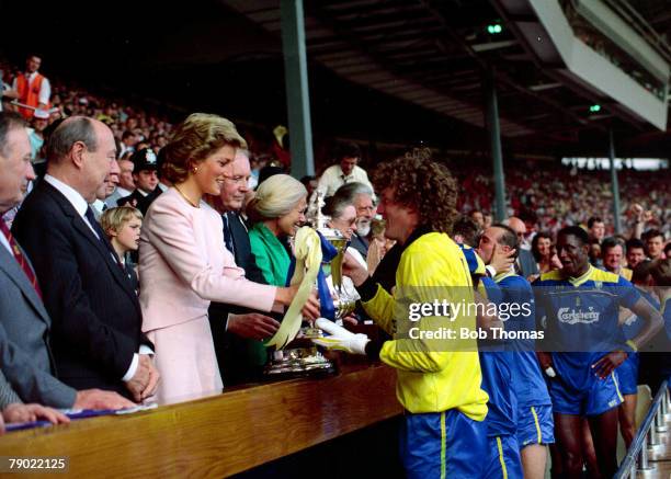 Cup Final, Wembley, Wimbledon v Liverpool 14th May 1988, Wimbledon goalkeeper and captain Dave Beasant receives the F,A Cup from H,R,H, The Princess...