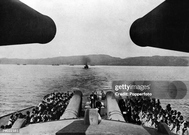 World War I, The Dardanelles Powerful view between two huge gun turrets of a Church service on board HMS -Queen Elizabeth+