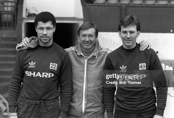 Football, Manchester, England, 13th February 1987, Manchester United's manager Alex Ferguson with Paul McGrath and Bryan Robson at Old Trafford