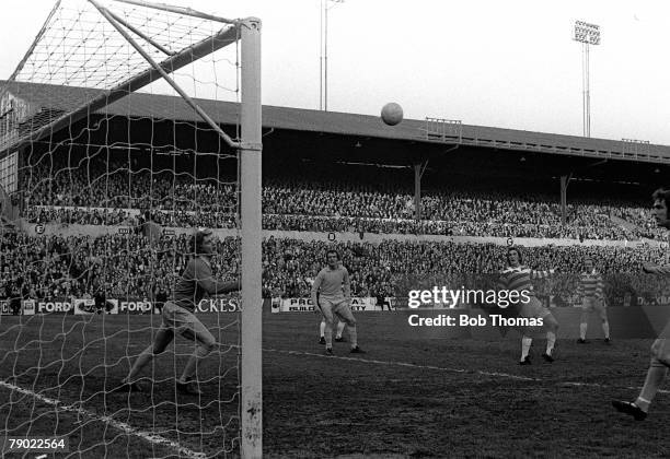 Football, England, 7th May 1973, Celtic's Kenny Dalglish heads the ball past Leeds goalkeeper Gary Sprake during Jack Charlton's testimonial match at...