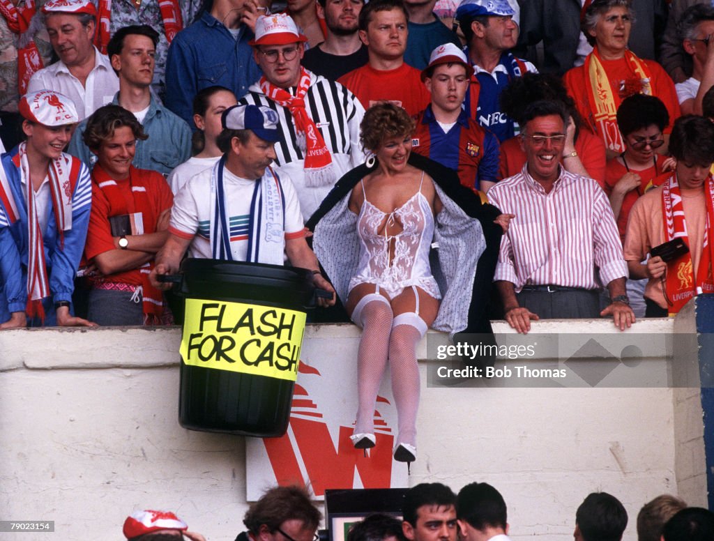 Football. 1989 FA Cup Final. Wembley. 20th May, 1989. Liverpool 3 v Everton 2 (aet.) A woman wearing see-through underwear as a charity collection for the Hillsborough Disaster Fund.