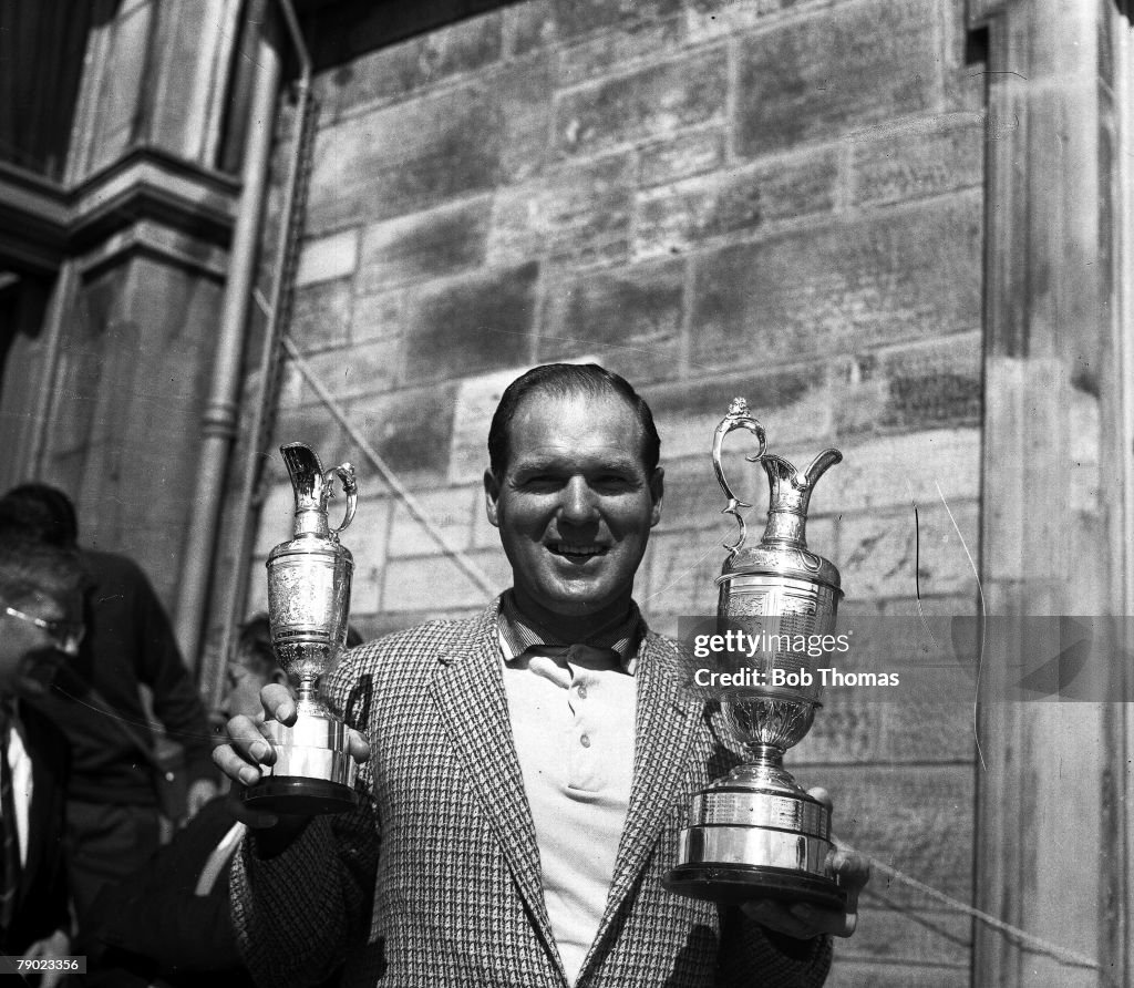 Golf. 1960 British Open Golf Championship. St. Andrews. Australia+s Kel Nagle celebrates with the Claret Jug as as he wins the 1960 Open.