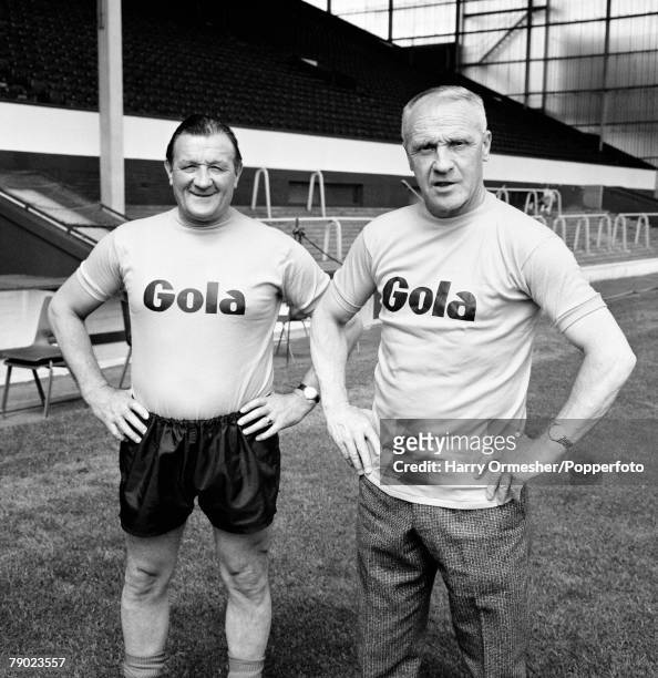 Liverpool manager Bill Shankly with his assistant Bob Paisley during the run-up to the FA Cup Final, on the pitch at Anfield in Liverpool, circa May...