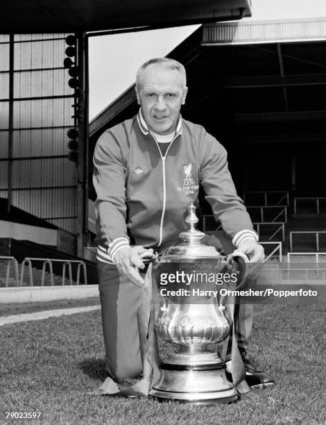 Liverpool FC manager Bill Shankly with the FA Cup trophy at Anfield in Liverpool, England, circa August 1974. Liverpool won the 1974 FA Cup Final...