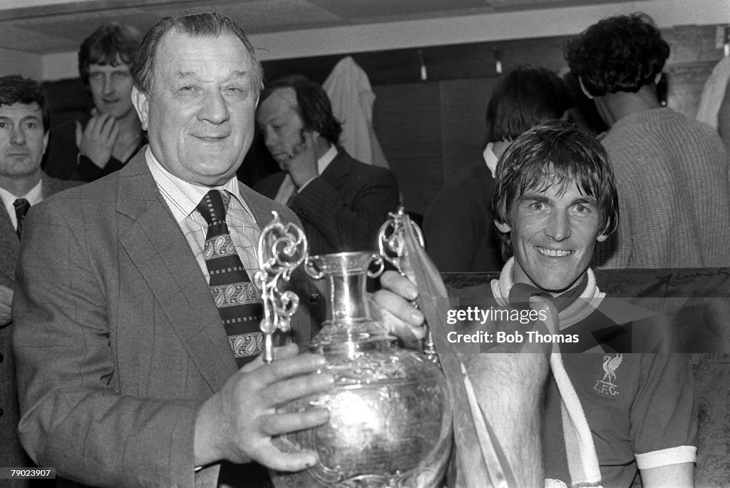 Football. Liverpool, England. League Division One. 3rd May 1980. Liverpool v Aston Villa. Liverpool manager Bob Paisley and Kenny Dalglish with the Championship trophy after the match at Anfield.