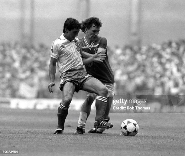 Football, 1982 World Cup Finals, Bilbao, Spain, 16th June 1982, England 3 v France 1, England's Bryan Robson battles for the ball in midfield with...