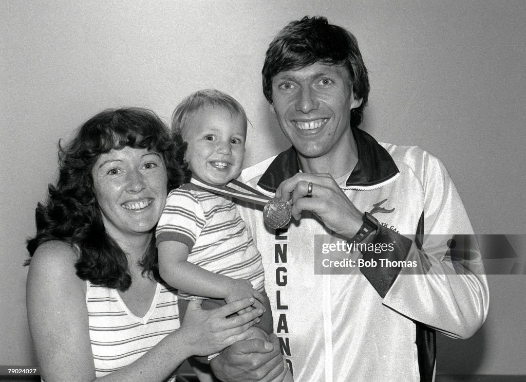 Sport. Athletics. 1982 Commonwealth Games. Brisbane, Australia. Men's 5000 Metres. England's 5000 Metres Champion David Moorcroft shows off his gold medal with his family.