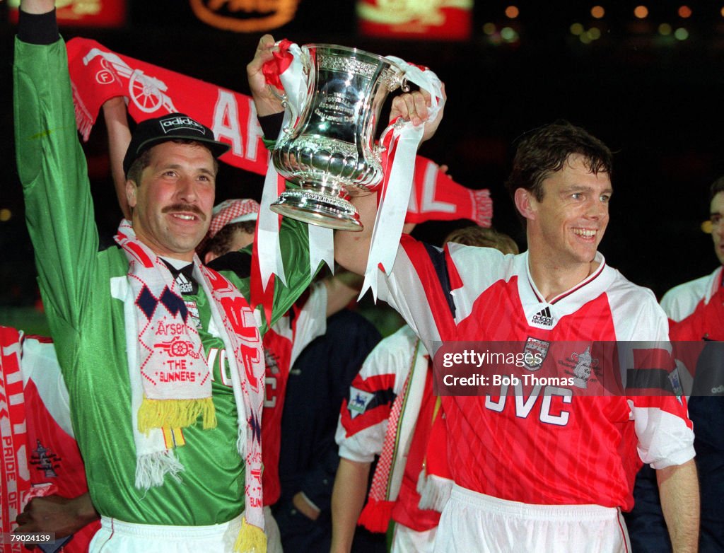 Football. 1993 FA Cup Final Replay. Wembley. 20th May, 1993. Arsenal 2 v Sheffield Wednesday 1. Arsenal's goalkeeper David Seaman and David O+Leary celebrate with the FA Cup trophy after their dramatic win.